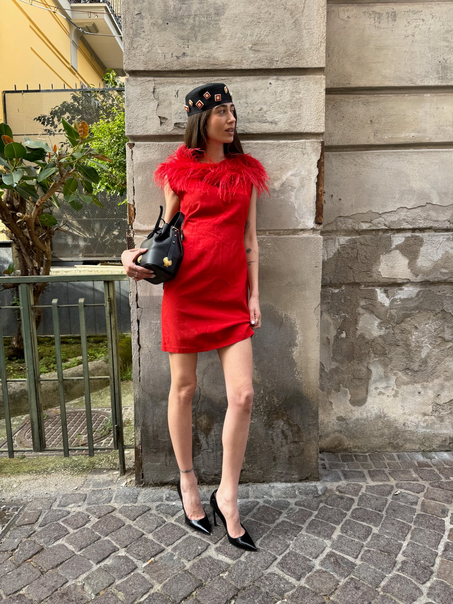 Feather trim red dress